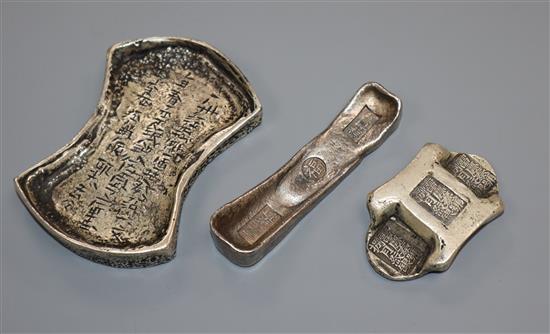 Three Chinese white metal ingots